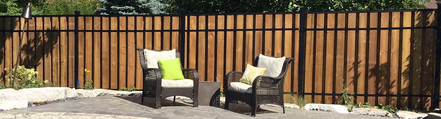 A fence by a pool by a fencing supply company
